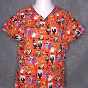 Halloween-Themed ScrubStar Womens Scrub Top L Orange Cartoon Monsters Print